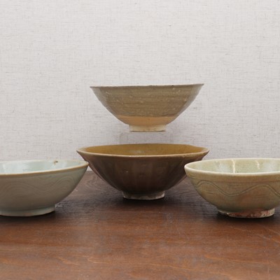 Lot 21 - A collection of four Chinese stoneware bowls