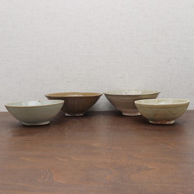 Lot 21 - A collection of four Chinese stoneware bowls