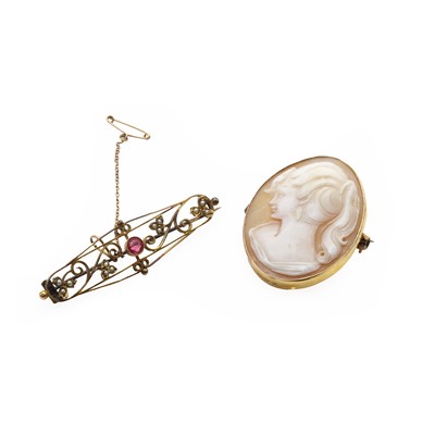 Lot 141 - An antique seed pearl brooch and a shell cameo brooch