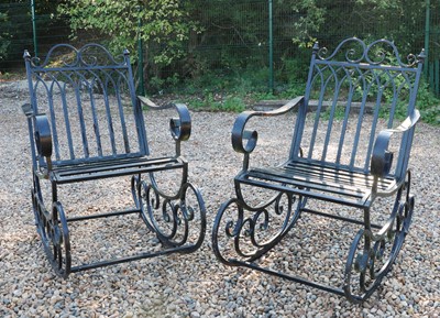 Lot 503 - A pair of wrought iron garden rocking chairs