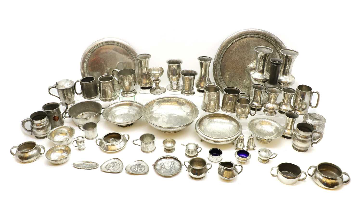 Lot 312 A large collection of Tudric pewter items,