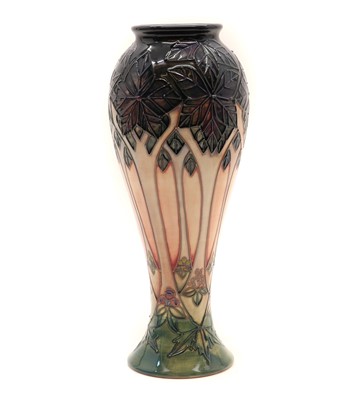 Lot 113 - A Moorcroft pottery 'Cluny' pattern vase