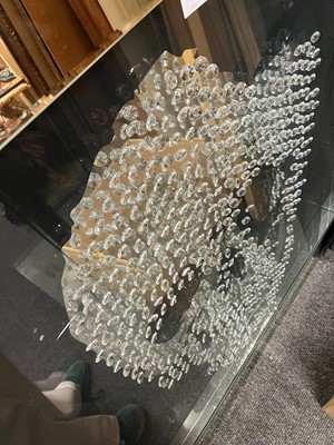 Lot 521 - A contemporary 'skull' wall mirror