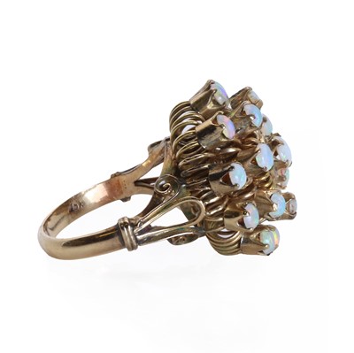 Lot 85 - A gold and opal abstract design ring