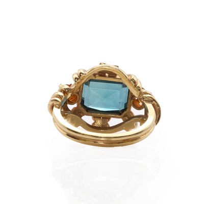 Lot 73 - A gold and synthetic blue spinel ring