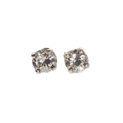Lot 40 - A pair of white gold diamond stud earrings