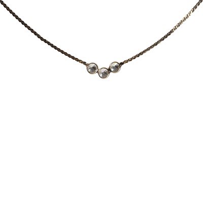 Lot 44 - A gold three stone diamond necklace