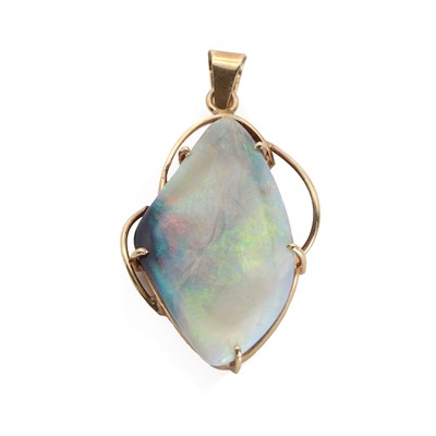 Lot 84 - A gold free form opal pendant