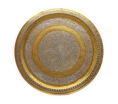 Lot 287 - A Persian brass charger