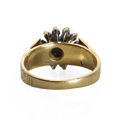 Lot 57 - An 18ct gold ruby and diamond floral cluster ring