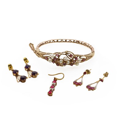 Lot 146 - A 9ct gold ruby and pearl hinged bangle