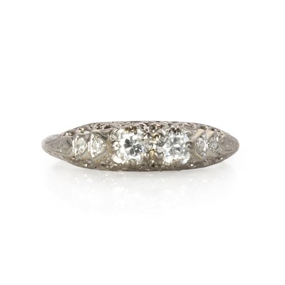 Lot 27 - An American Art Deco two stone diamond ring