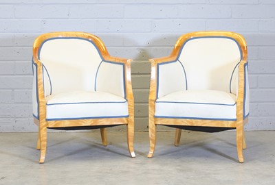 Lot 406 - A pair of Biedermeier-style birchwood tub armchairs