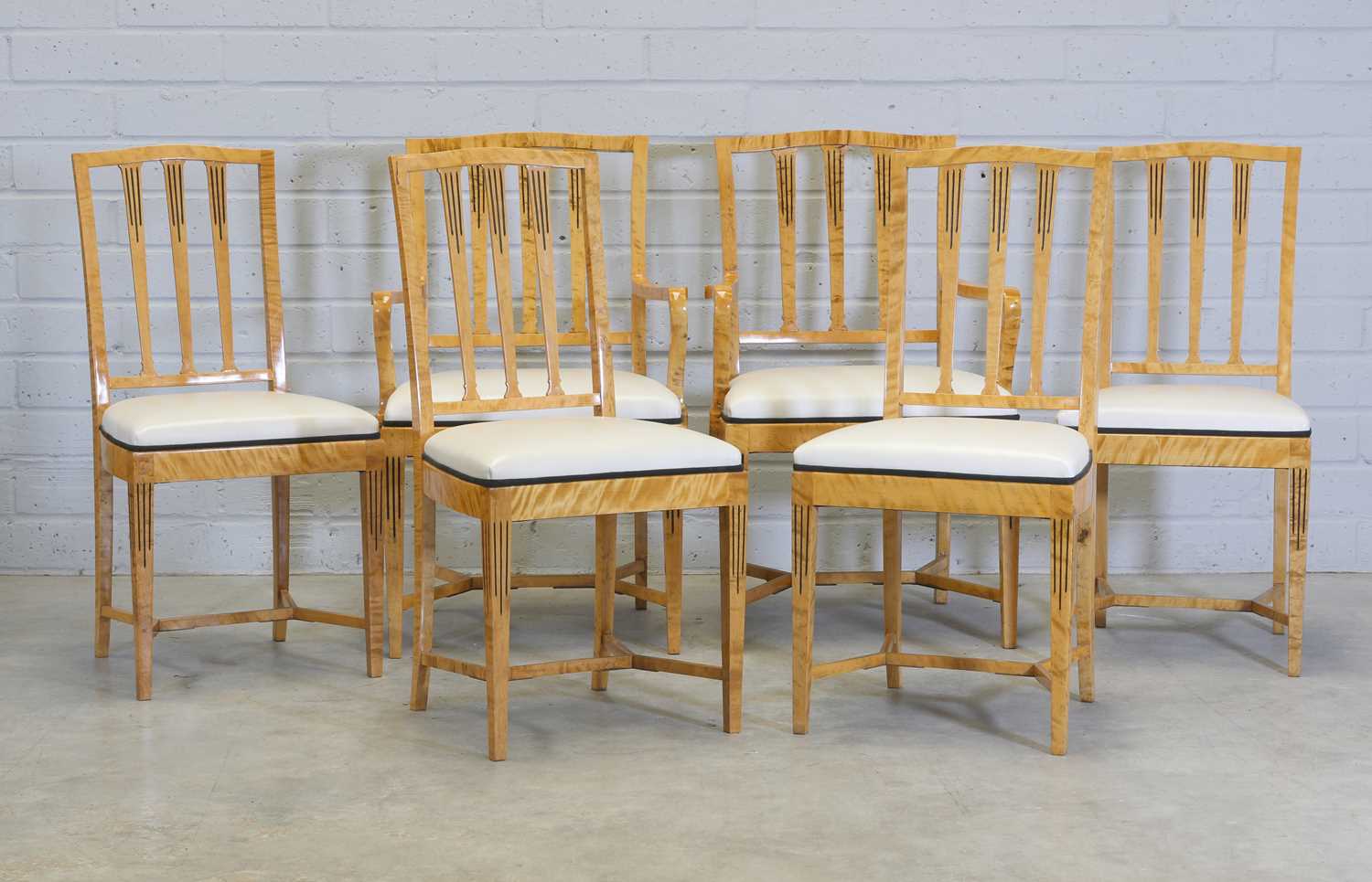 Lot 537 A set of birch dining chairs in Biedermeier