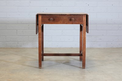 Lot 398 - A Heals style oak drop-leaf table