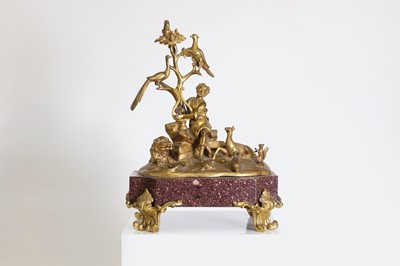 Lot 245 - An ormolu and porphyry figure group