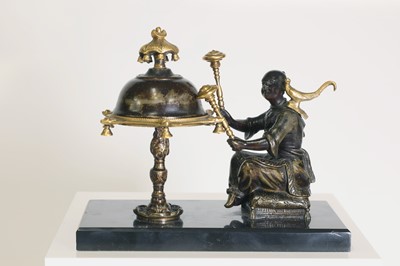 Lot 253 - A chinoiserie gilt and patinated bronze desk bell