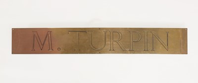 Lot 262 - A brass plaque inscribed 'M. Turpin'