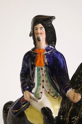 Lot 263 - A Staffordshire pottery figure of Dick Turpin