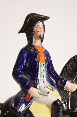 Lot 263 - A Staffordshire pottery figure of Dick Turpin