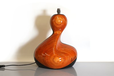 Lot 323 - A carved and lacquered table lamp