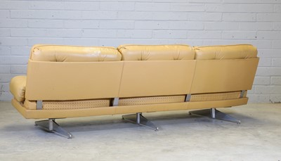 Lot 448 - A mustard yellow leather three-seater settee