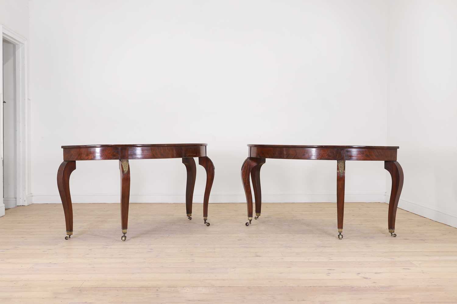 Lot 139 - A pair of mahogany console tables