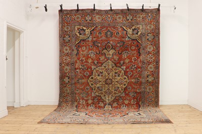 Lot 280 - A Heriz wool carpet
