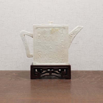 Lot 133 - A Chinese white-glazed teapot