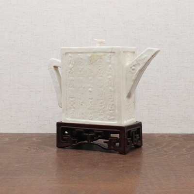 Lot 133 - A Chinese white-glazed teapot