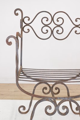 Lot 430 - A set of four wrought-iron garden chairs