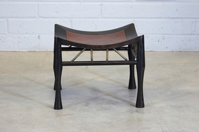 Lot 89 - An ebonised Thebes stool