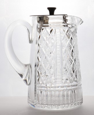 Lot 58 - A cut glass and silver-mounted water jug