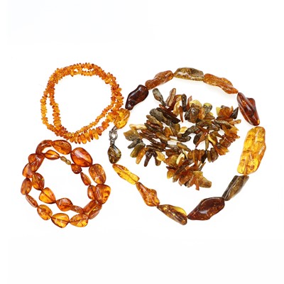 Lot 163 - A group of amber and copal bead necklaces