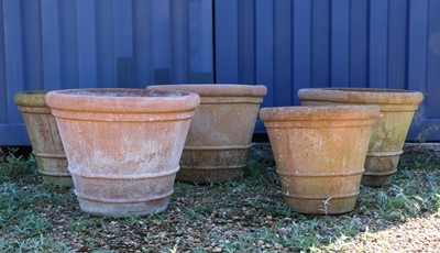Lot 481 - A set of four Italian terracotta garden terrace urns