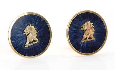 Lot 269 - A pair of 18ct gold and blue enamel heraldic cufflinks