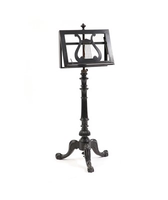Lot 385 - A Victorian telescopic ebonised music stand