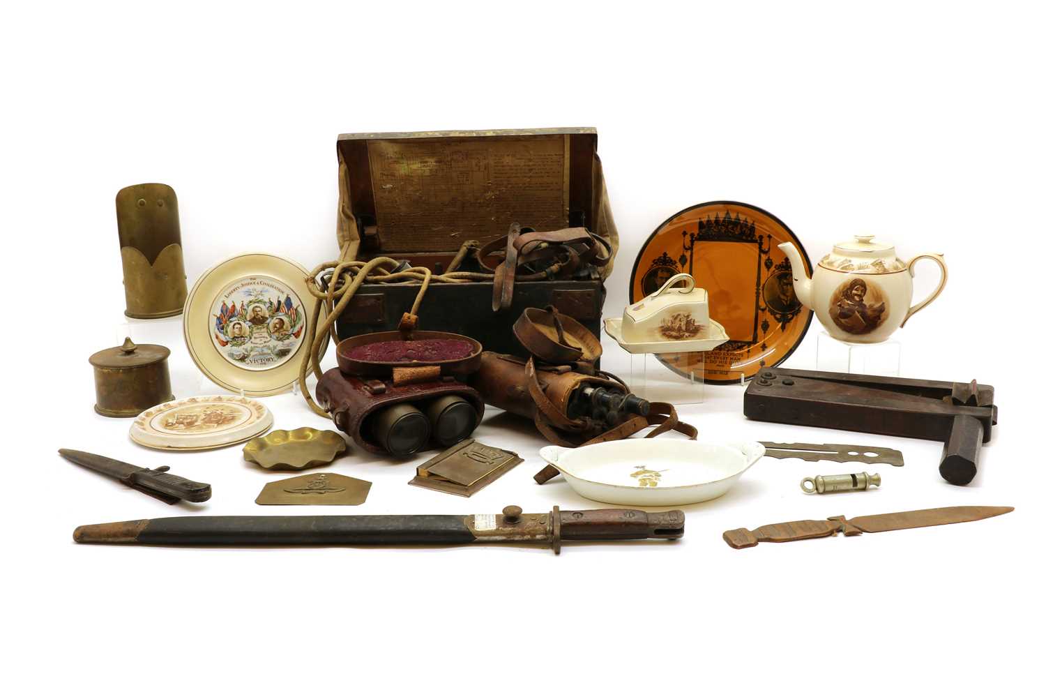 Lot 123 - A group of WWI memorabilia, equipment and trench art