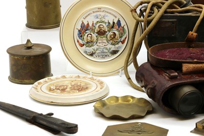 Lot 123 - A group of WWI memorabilia, equipment and trench art