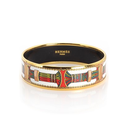 Lot 1468 - An Hermès gold plated and enamelled bangle
