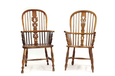 Lot 325 - A near pair of elm Windsor chairs