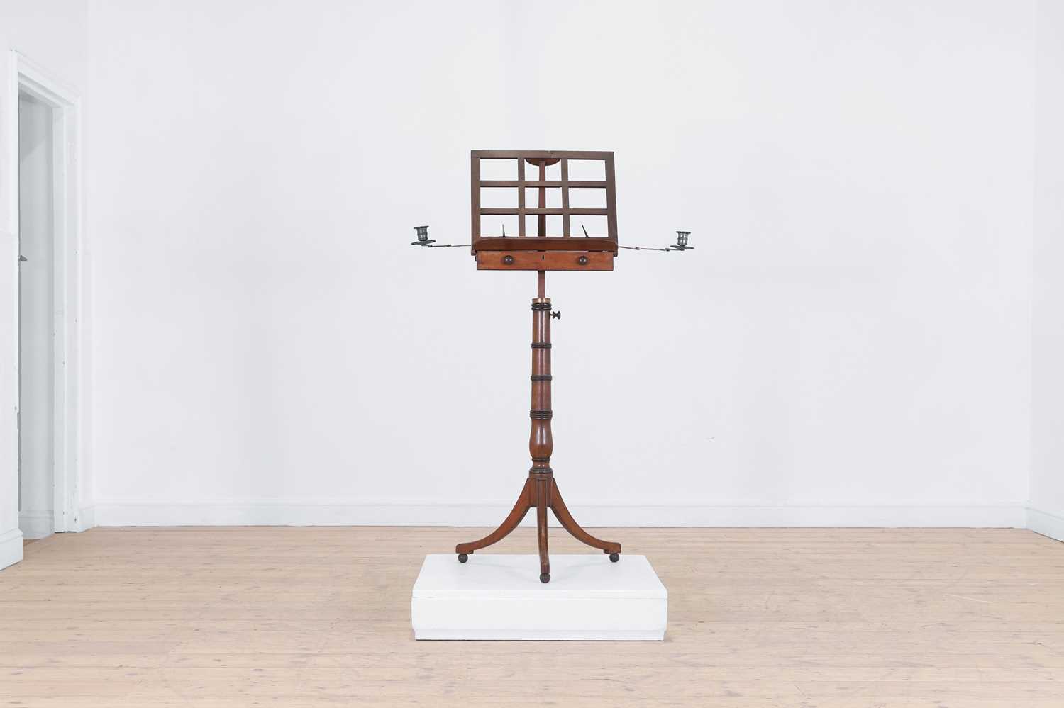 Lot 270 - A Regency mahogany and ebonised music stand