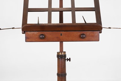 Lot 270 - A Regency mahogany and ebonised music stand