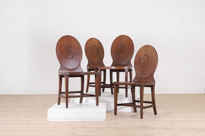 Lot 59 - A set of four George III mahogany hall chairs