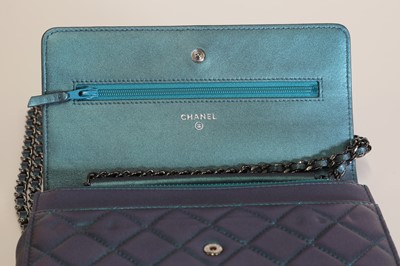 Lot 316 - A Chanel iridescent green timeless cross body wallet