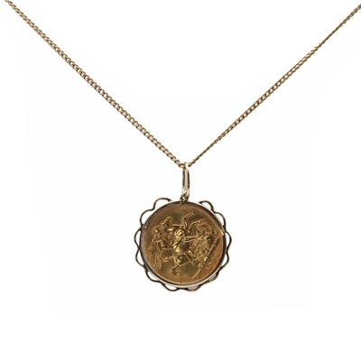 Lot 211 - A gold mounted sovereign pendant
