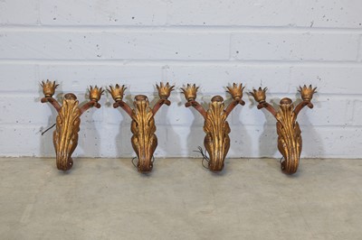 Lot 225 - A set of four French twin-branch wall sconces