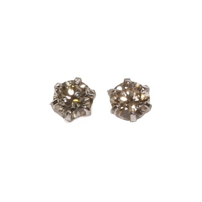 Lot 45 - A pair of single stone diamond stud earrings