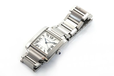 Lot 304 - A stainless steel Cartier Tank Française automatic bracelet watch