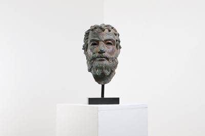 Lot 224 - A patinated bronze head